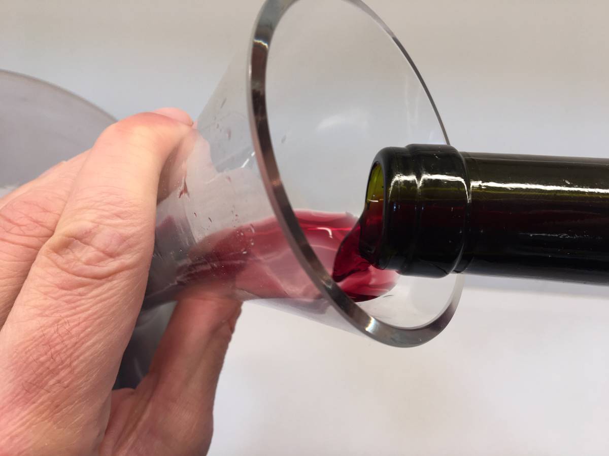 During decanting, we will make sure that the wine is poured into the lower part of the decanter glass