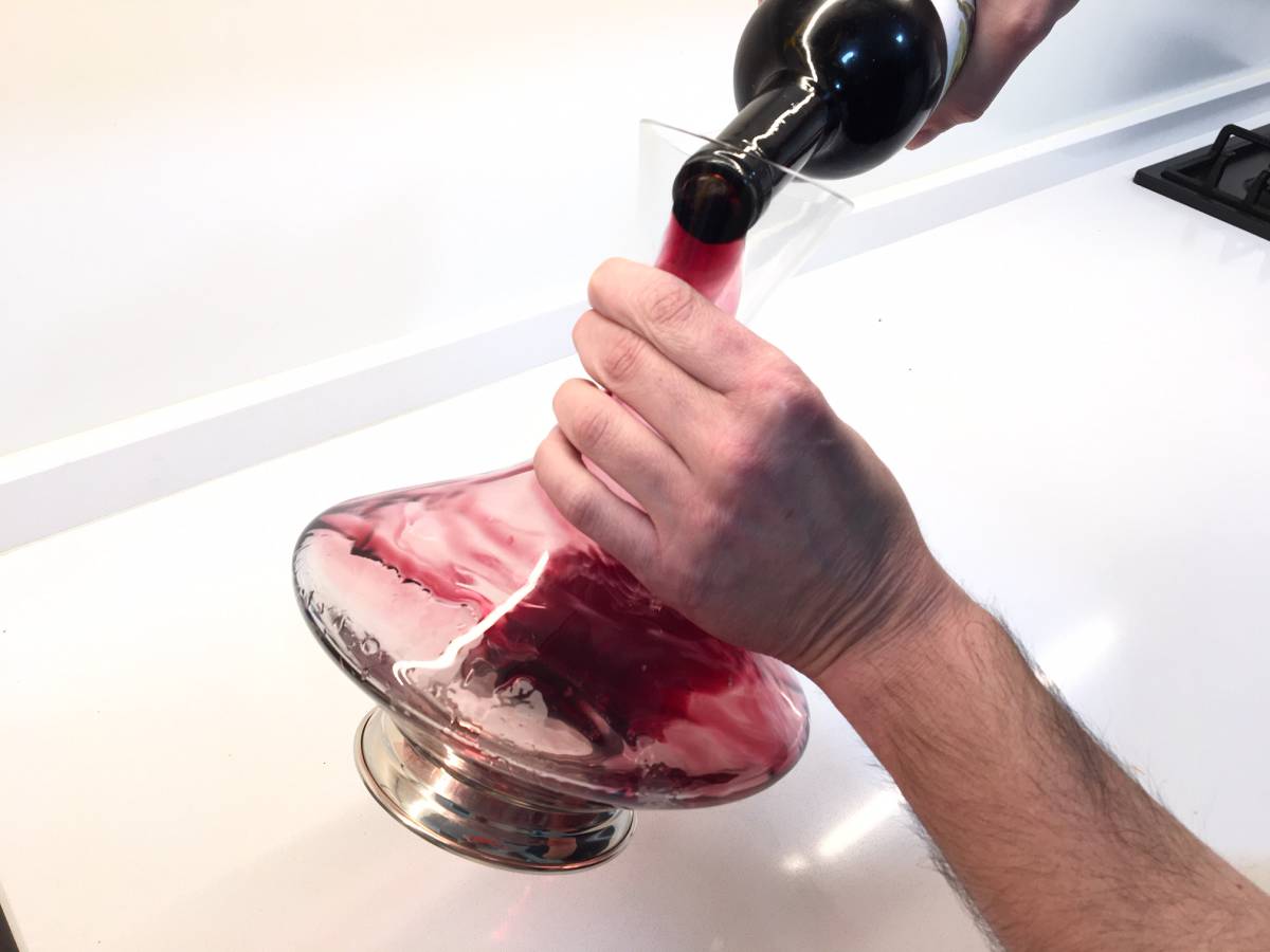 Make sure that when the wine is transferred to the decanter it falls into the upper part of the container
